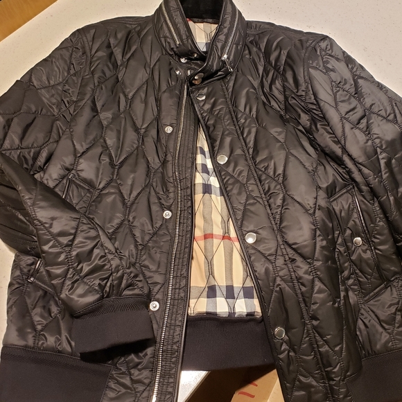Burberry stand collar military quilted jacket with packaway hood/black/size48US